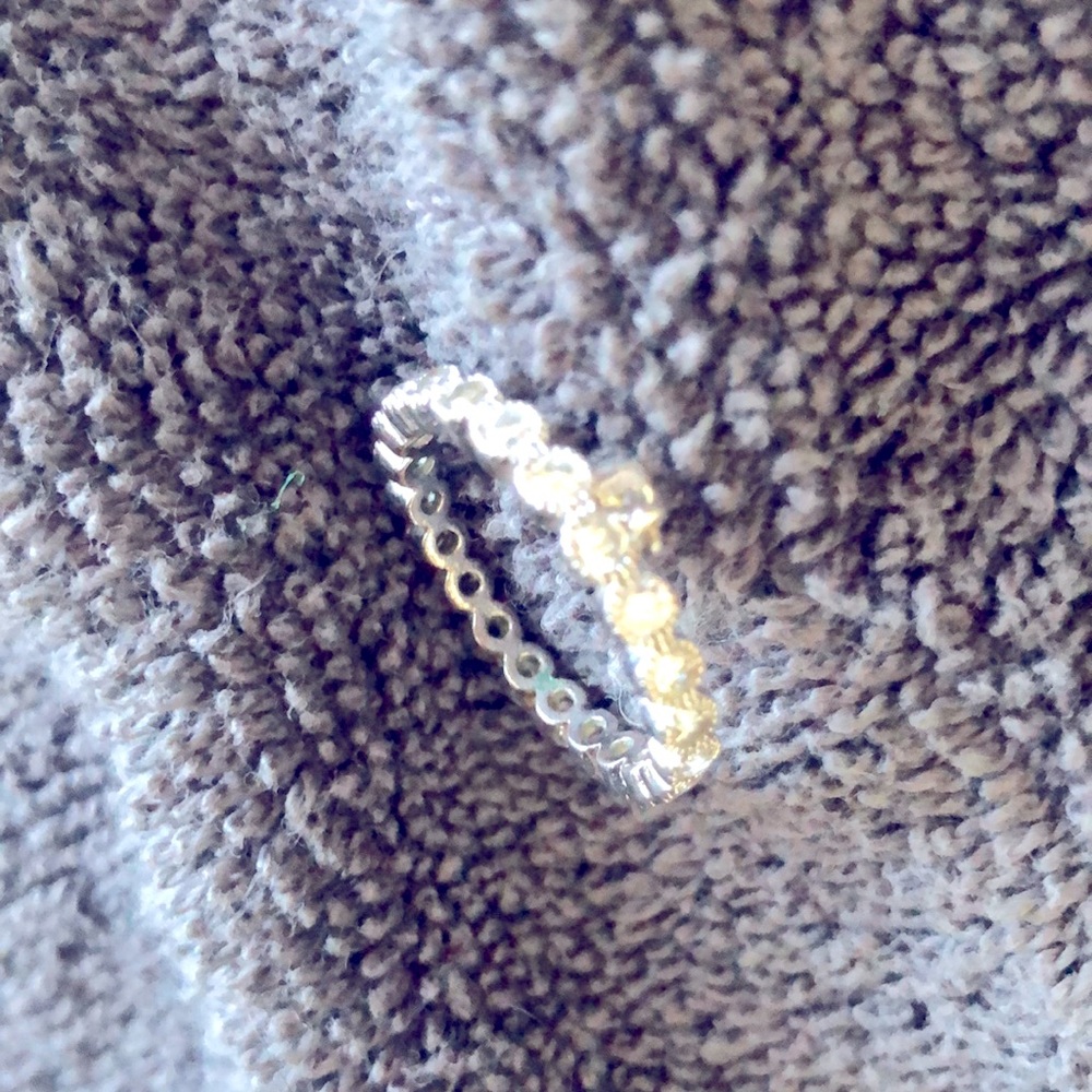Gorgeous size 8 ring. Eternity band with CZ stones.